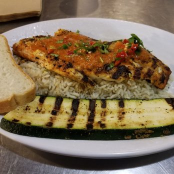 California Fish Grill - Berramundi with peri-peri sauce, rice, grilled zucchini and bread. - Seafood Near Me - Brea, California California Fish Grill - Berramundi with peri-peri sauce, rice, grilled zucchini and bread. - Seafood Near Me - Brea, California