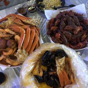 Red Claws Crab Shack - RC bucket #7 : crawfish, mussels, crab leg, shrimp, corn, sausage, and potatoes. - Cajun/Creole Near Me - Arlington, Texas Red Claws Crab Shack - RC bucket #7 : crawfish, mussels, crab leg, shrimp, corn, sausage, and potatoes. - Cajun/Creole Near Me - Arlington, Texas