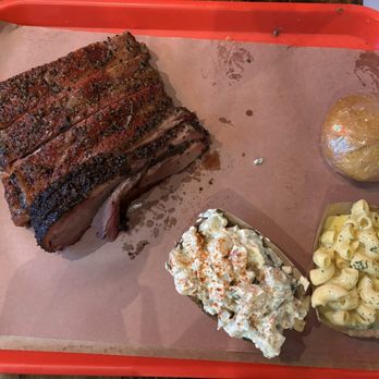 Terry Black's Barbecue - 1/2 lb brisket, 1/2 lb pork ribs, small potato salad, small mac, and cornbread - Barbeque Near Me - Austin, Texas