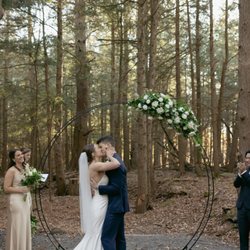 Karen's Flower Shoppe - The arbor piece was gorgeous, and then Karen repurposed it into a beautiful mantelpiece when we went indoors for the reception!