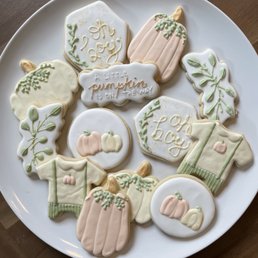 a plate of decorated cookies