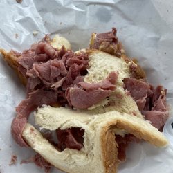 Loedes Famous Ruben Deli - Grilled CB in white? One bite taken.