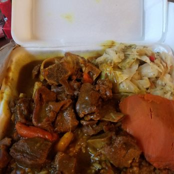 Irie Jerk Hut - Curry goat on a good day. - Caribbean Near Me - Calumet City, Illinois Irie Jerk Hut - Curry goat on a good day. - Caribbean Near Me - Calumet City, Illinois