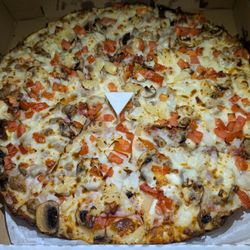 Pizza Rita - 5 pounder pizza with ranch sauce instead of red sauce, no olives or green peppers. Not enough ranch sauce, but still tasty.