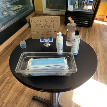 The Ridge Cafe - Table setup with masks and sanitizer. - Cafes Near Me - North San Juan, California