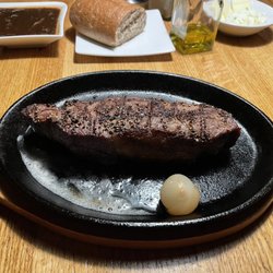 Steak Pit - NY strip with a side of mushroom peppercorn sauce