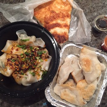 Beijing Dumpling - Clockwise from top: sesame pancake (plain), chive and pork pan fried dumplings and wonton with spicy sauce. Delicious! - Chinese Near Me - Forest Hills, New York Beijing Dumpling - Clockwise from top: sesame pancake (plain), chive and pork pan fried dumplings and wonton with spicy sauce. Delicious! - Chinese Near Me - Forest Hills, New York