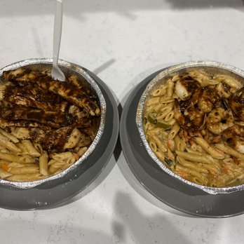 Footprints Cafe - (Left) Rasta Pasta with Jerk chicken (right) same but with shrimp. - Bars Near Me - Brooklyn, New York Footprints Cafe - (Left) Rasta Pasta with Jerk chicken (right) same but with shrimp. - Bars Near Me - Brooklyn, New York