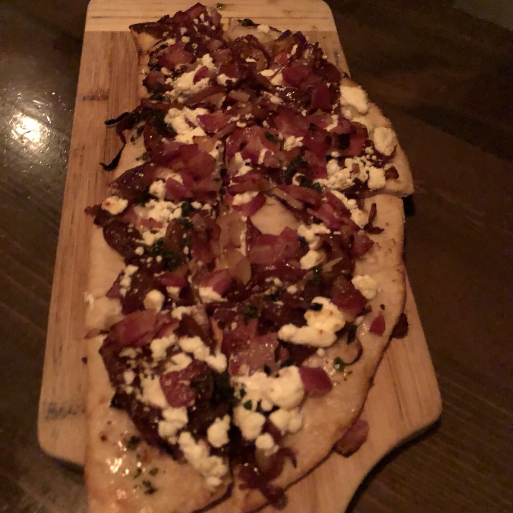 V's restaurant + bar - Flatbread - Pancetta, Caramelized Red Onions & Goat Cheese - Italian Near Me - Malibu, California V's restaurant + bar - Flatbread - Pancetta, Caramelized Red Onions & Goat Cheese - Italian Near Me - Malibu, California