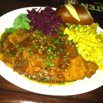 Cafe 20 - German night! Schnitzel, spatzel, cabbage and a pretzel roll. - American Near Me - Marengo, Illinois