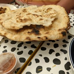 a plate of flatbreads on a table