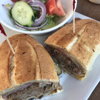 Jimmy's Grand Cafe - Cuban Midnight - pulled pork, ham, Swiss cheese, pickles, and mustard on a garlic panini - Diners Near Me - Bronx, New York Jimmy's Grand Cafe - Cuban Midnight - pulled pork, ham, Swiss cheese, pickles, and mustard on a garlic panini - Diners Near Me - Bronx, New York