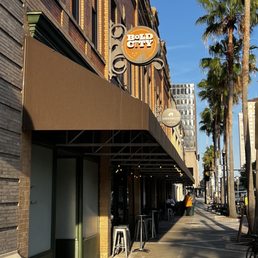 a coffee shop on the sidewalk a coffee shop on the sidewalk