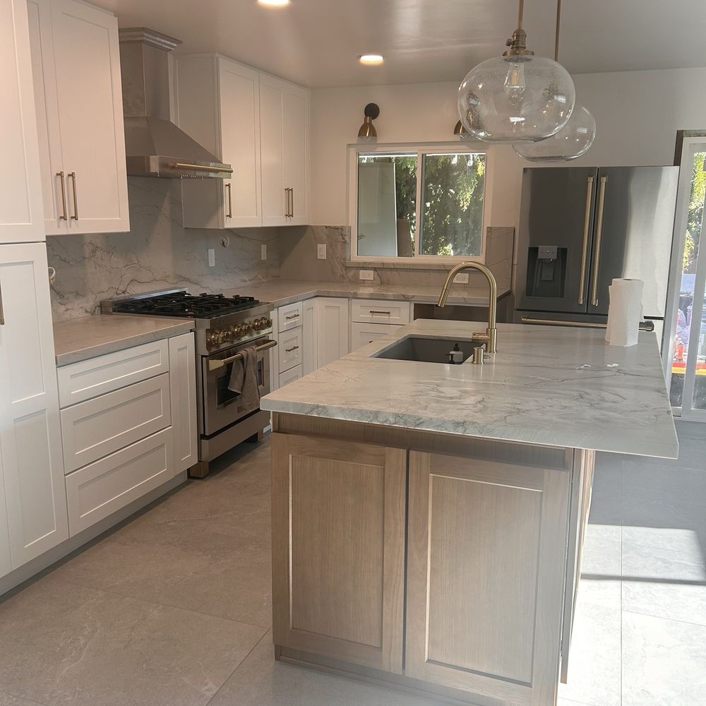 After! Gorgeous combination of white and white oak beveled cabinets. After! Gorgeous combination of white and white oak beveled cabinets.