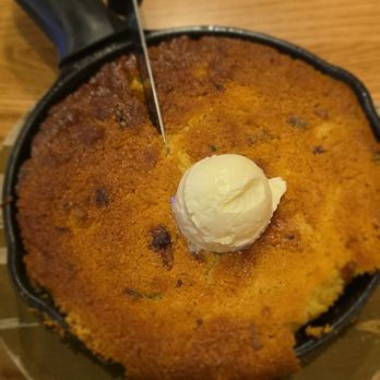 Midwood Smokehouse - Cornbread skillet with whipped butter and honey - Barbeque Near Me - Charlotte, North Carolina Midwood Smokehouse - Cornbread skillet with whipped butter and honey - Barbeque Near Me - Charlotte, North Carolina