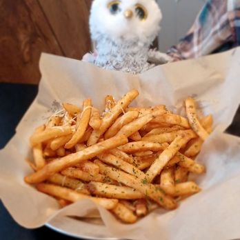 The Bridge Bistro & Brews - My kid decided on the appetizer of garlic fries.  She loved them. - Pizza Near Me - Umatilla, Oregon