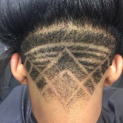 Lotus 21 Salon Studio - Just a free style added to this undercut ! It's so cool to have a design hidden back their !!