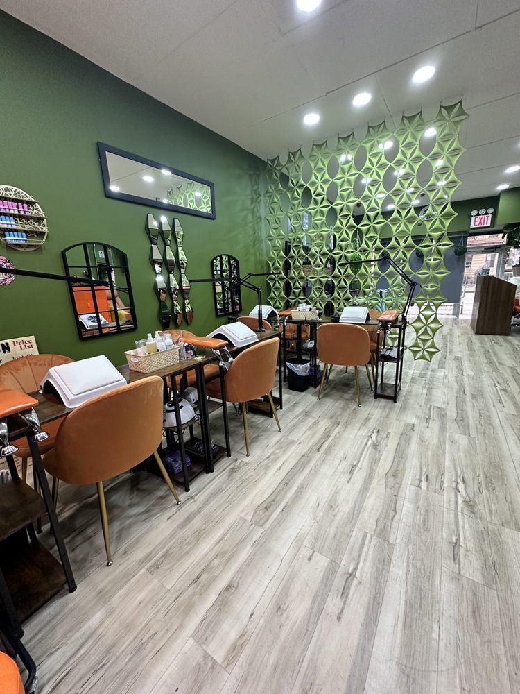 Ervin's Barbershop Nails Logo
