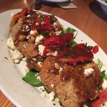 Jonah's Fish & Grits - Fried green tomatoes, fresh tomato and feta cheese crumbles on top - Seafood Near Me - Thomasville, Georgia Jonah's Fish & Grits - Fried green tomatoes, fresh tomato and feta cheese crumbles on top - Seafood Near Me - Thomasville, Georgia