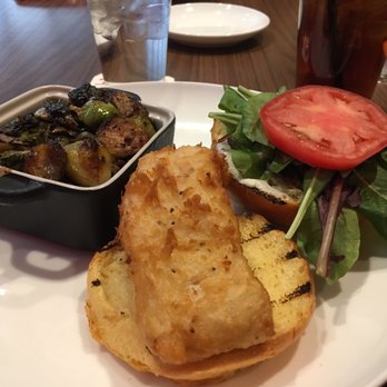 Revel - Fried cod with side of Brussels sprouts and bacon - Bars Near Me - Pittsburgh, Pennsylvania Revel - Fried cod with side of Brussels sprouts and bacon - Bars Near Me - Pittsburgh, Pennsylvania