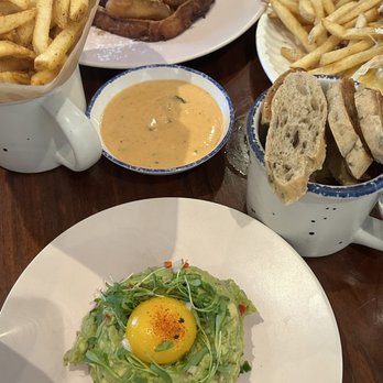 Unconventional Diner - Avocado toast, French Toast in the background. - Breakfast & Brunch Near Me - Washington, DC, District of Columbia