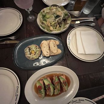 Coast Range - Top left drink- lychee martinee; top dish - Cesar salad; middle dish - beef tartare; bottom dish - spicy tuna crispy rice - Steakhouses Near Me - Solvang, California