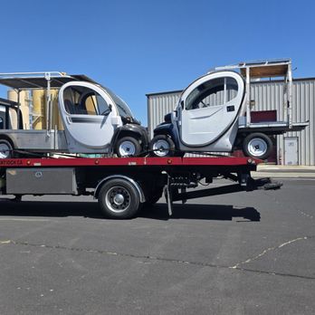 Mt Diablo Towing & Transport - David taking a look at the carts on the flatbed. - Towing Near Me - Antioch, California