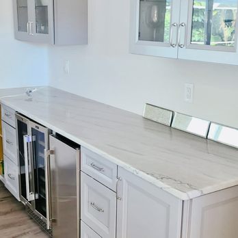 Geordis Construction - a kitchen with white cabinets - General Contractors Near Me - North Key Largo, Florida Geordis Construction - a kitchen with white cabinets - General Contractors Near Me - North Key Largo, Florida