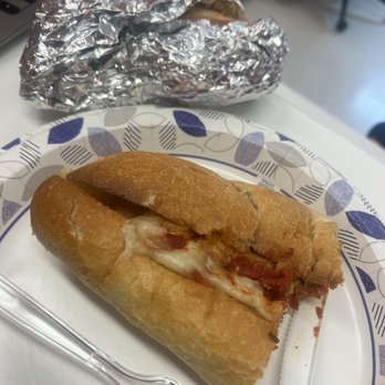 La Nostra Pizzeria - a plate with a sandwich on it - Pizza Near Me - New York, New York