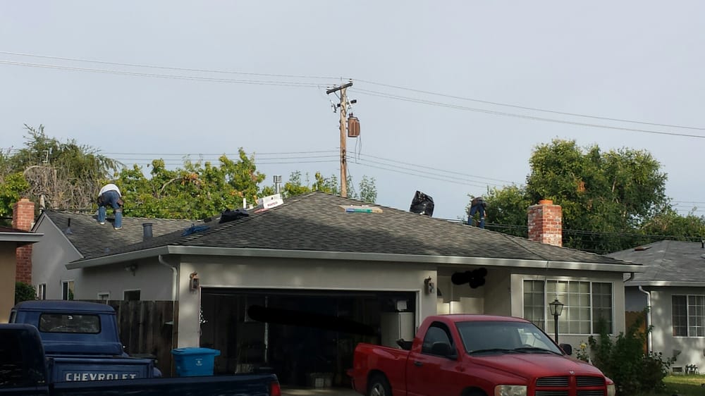 Slide of TNT Roofing