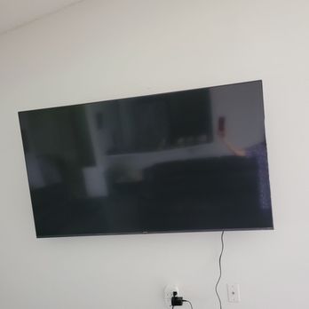 JJM Homes - A 70" t.v. that J.J. mounted. - Flooring Near Me JJM Homes - A 70" t.v. that J.J. mounted. - Flooring Near Me