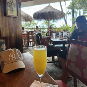 Duke's Waikiki - Mimosa with fresh squeezed orange juice just hits differently - Hawaiian Near Me - Honolulu, Hawaii