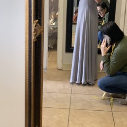 The other side of the dress is long. The back side is completely uneven.