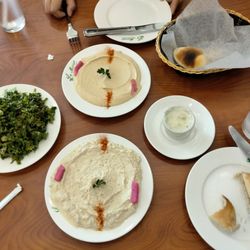 La Marsa Hamtramck - Hommos, baba ghannooj, taboule salad and complimentary bread and garlic sauce.