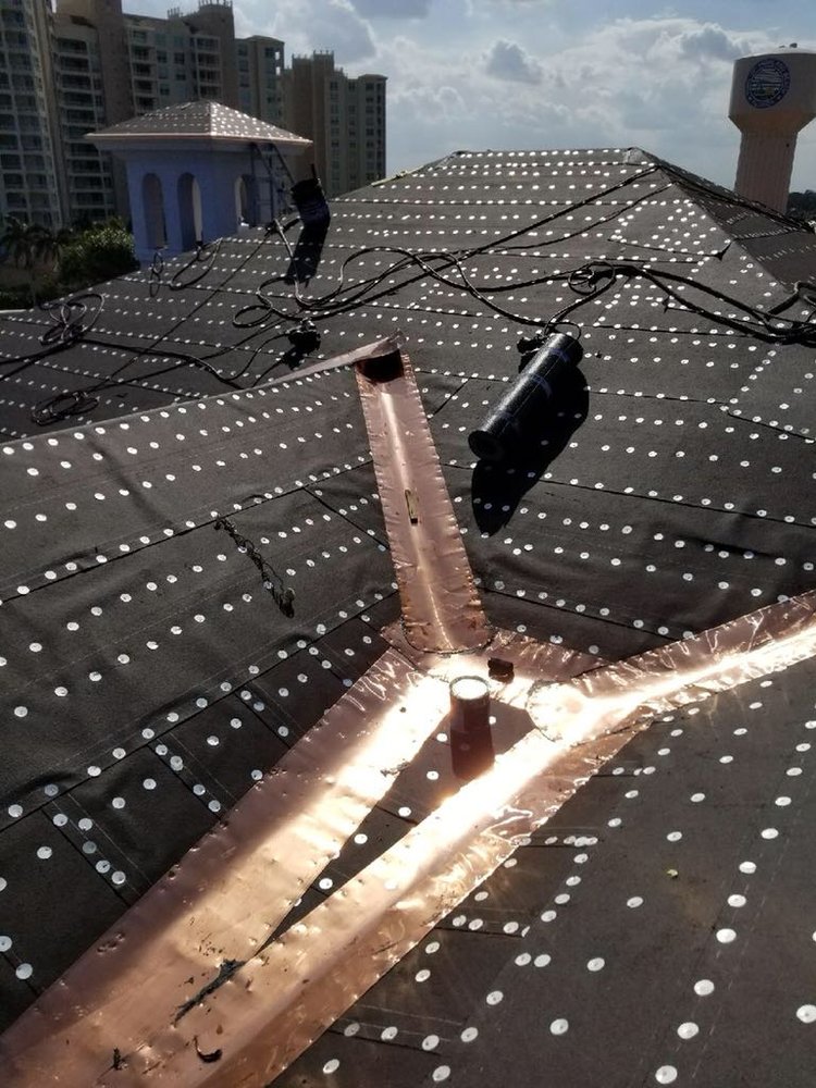 Slide of Bentley Roofing