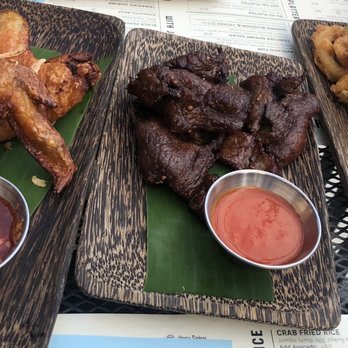 Tiki Thai - Hot gai wings, heaven beef, and calamari - Tiki Bars Near Me - Reston, Virginia Tiki Thai - Hot gai wings, heaven beef, and calamari - Tiki Bars Near Me - Reston, Virginia