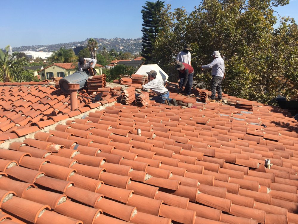 Slide of Top Roofing Inc