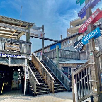 Flora-Bama Lounge, Package & Oyster Bar - Between oyster and main bar - Music Venues Near Me - Pensacola, Florida Flora-Bama Lounge, Package & Oyster Bar - Between oyster and main bar - Music Venues Near Me - Pensacola, Florida