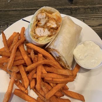 Syberg's - Chesterfield - Buffalo chicken wrap and sweet potato fries - New American Near Me - Chesterfield, Missouri Syberg's - Chesterfield - Buffalo chicken wrap and sweet potato fries - New American Near Me - Chesterfield, Missouri
