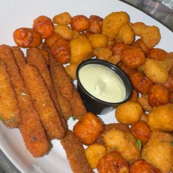 The Lola - Fried Fritters - Cocktail Bars Near Me - Hoboken, New Jersey The Lola - Fried Fritters - Cocktail Bars Near Me - Hoboken, New Jersey