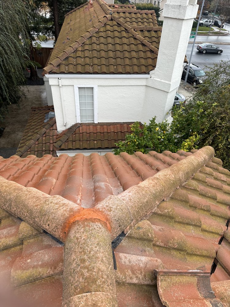 Slide of Cleans Roofing