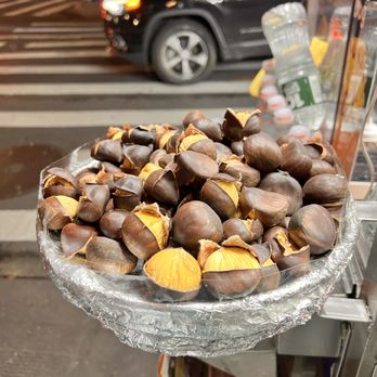 Cartier Fifth Avenue Mansion - Vendor out front with chestnuts - Jewelry Near Me - New York, New York Cartier Fifth Avenue Mansion - Vendor out front with chestnuts - Jewelry Near Me - New York, New York