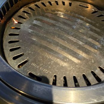 Manna BBQ | Westgate - Black sanitizing water to clean the grills yummmmm! - Korean Near Me - Glendale, Arizona