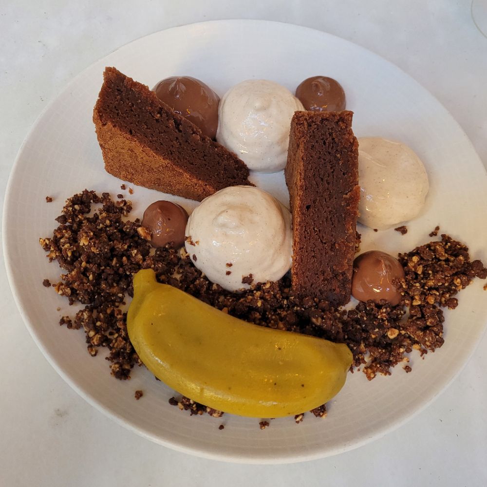 Chocolate cake with platano (banana). Banana mixed with a little bit of pepper served as a gelatin with chocolate and ice cream. Excellent Chocolate cake with platano (banana). Banana mixed with a little bit of pepper served as a gelatin with chocolate and ice cream. Excellent