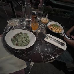 Spinach gnudi, shrimp tagliatelle, orange dream soda, lychee-tini, passione cocktail