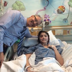 Newton Peter O MD - My daughter and dr. Newton after surgery