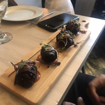 Bocaditos Bistro - Bacon wrapped dates - Breakfast & Brunch Near Me - New York, New York Bocaditos Bistro - Bacon wrapped dates - Breakfast & Brunch Near Me - New York, New York