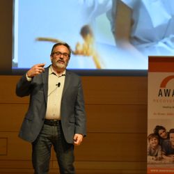 Ellenhorn - Dr. Ross Ellenhorn, PhD, CEO and founder of Ellenhorn presenting at a conference.