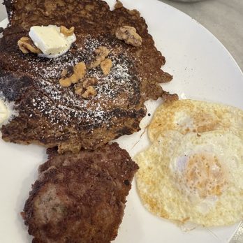 Breakfast by Salt’s Cure - Banana nut pancakes with 2 sausages and 2 over easy eggs - Breakfast & Brunch Near Me - New York, New York Breakfast by Salt’s Cure - Banana nut pancakes with 2 sausages and 2 over easy eggs - Breakfast & Brunch Near Me - New York, New York