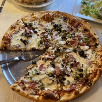 Napoli's Pizza & Restaurant - Extra large pizza - Italian Near Me - Corsicana, Texas Napoli's Pizza & Restaurant - Extra large pizza - Italian Near Me - Corsicana, Texas